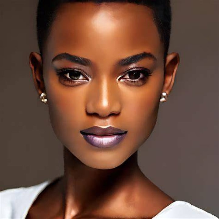 But the face on the pillow, rosy in the firelight, is certainly